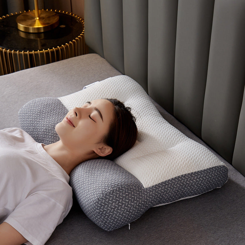 An ergonomic memory foam cervical traction pillow