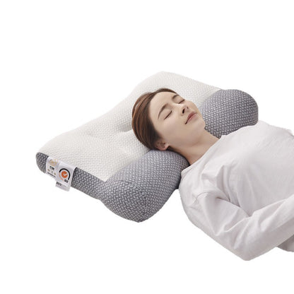 An ergonomic memory foam cervical traction pillow