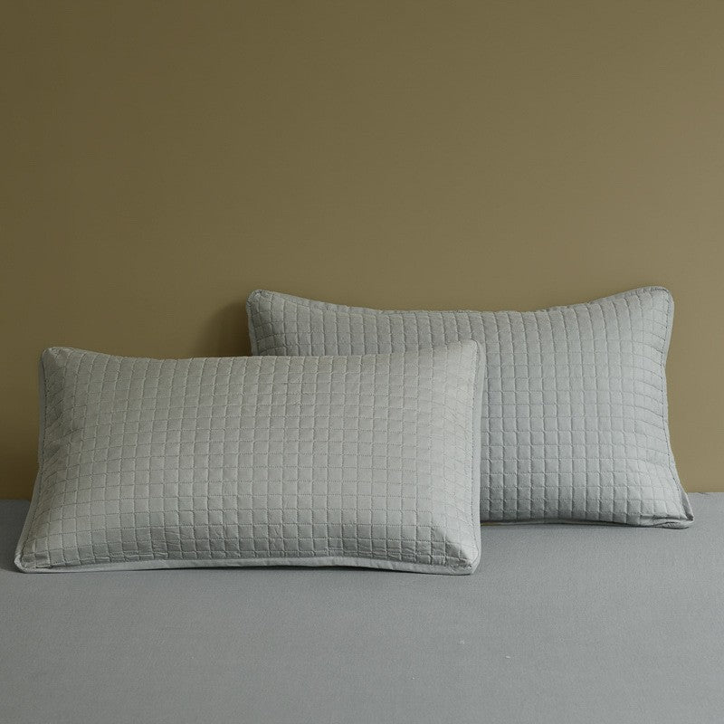 An ergonomic memory foam cervical traction pillow